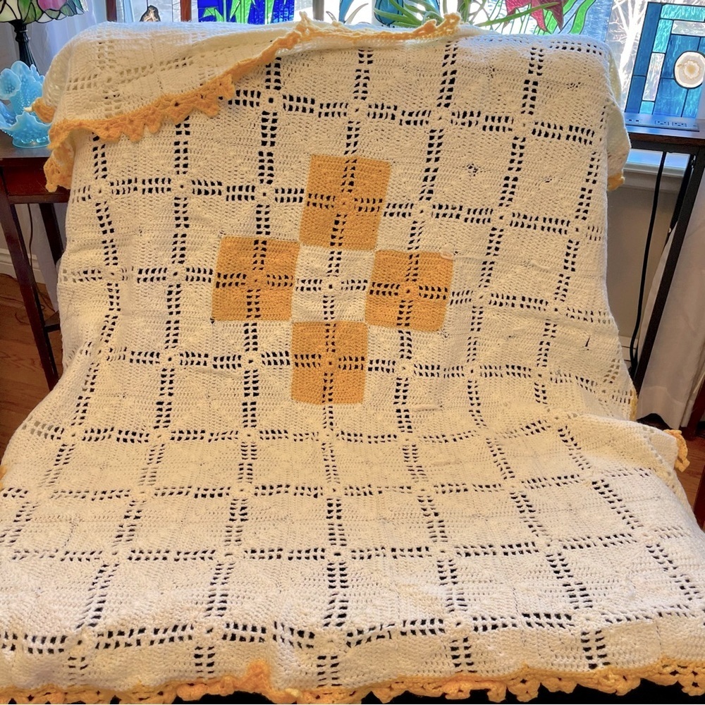 Handmade yellow and white crochet knit blanket
